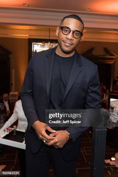 Television presenter Reggie Yates attends the inaugural International Fashion Show at Rosewood Hotel on May 25, 2018 in London, England.