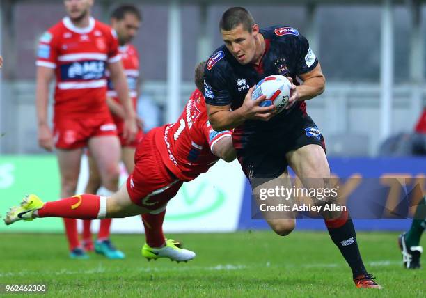 Joel Tomkins of Wigan Warriors scores a try during the Betfred Super League at KCOM Craven Park on May 25, 2018 in Hull, England.