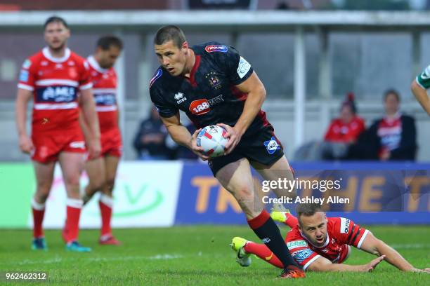 Joel Tomkins of Wigan Warriors scores a try during the Betfred Super League at KCOM Craven Park on May 25, 2018 in Hull, England.