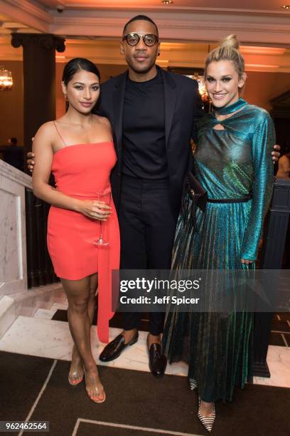 Vanessa White, Reggie Yates and Ashley Roberts attend the inaugural International Fashion Show at Rosewood Hotel on May 25, 2018 in London, England.