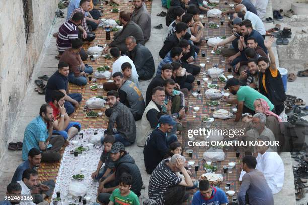 Some eight hundred people break the Ramadan fast during an event organized by "The Charity Foundation" for the displaced people of Ghouta and the...