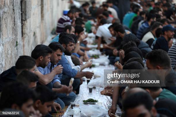 Some eight hundred people break the Ramadan fast during an event organized by "The Charity Foundation" for the displaced people of Ghouta and the...