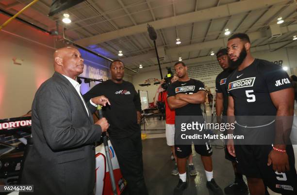 Coach Phil Horton speaks with competitors during the NASCAR Drive for Diversity Combine at the NASCAR Research and Development Center on May 25, 2018...