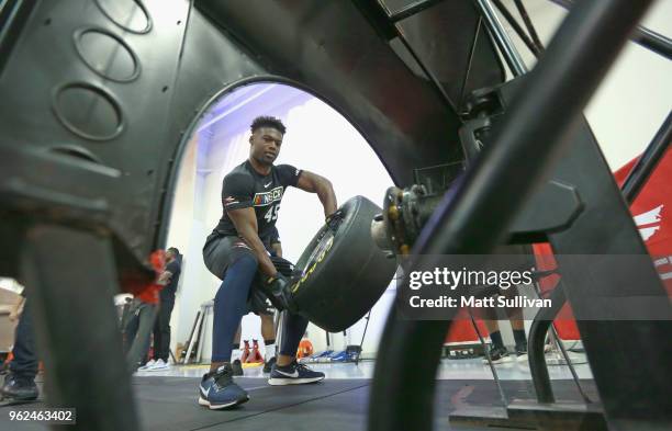 Joshua Patrick changes a tire during the NASCAR Drive for Diversity Combine at the NASCAR Research and Development Center on May 25, 2018 in Concord,...