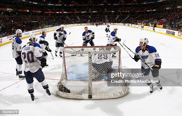 Alexander Steen, Erik Johnson, Keith Tkachuk Ty Conklin, Cam Janssen, Brad Boyes and BJ Crombeen of the St. Louis Blues warm up against the Ottawa...