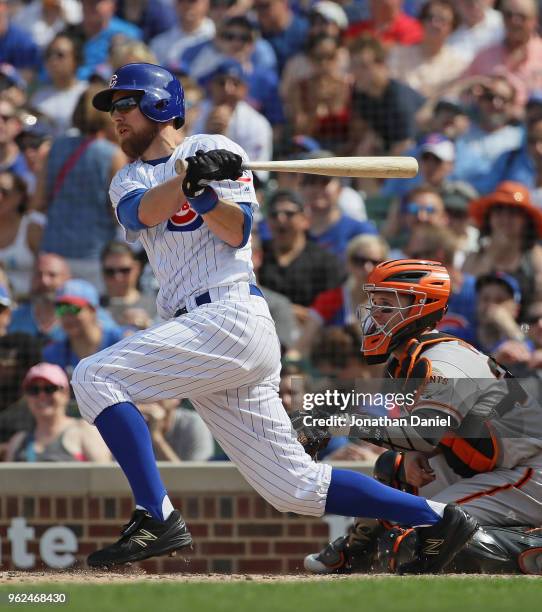 Ben Zobrist of the Chicago Cubs hits a two run double in the 7th inning against the San Francisco Giants at Wrigley Field on May 25, 2018 in Chicago,...