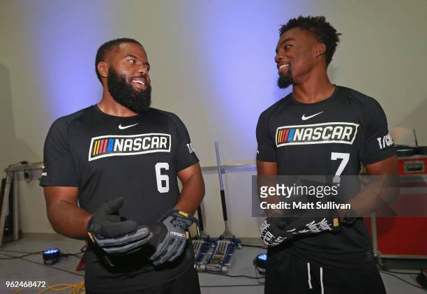 Twin brother Jordan Boyd and Justin Boyd talk during the NASCAR Drive for Diversity Combine at the NASCAR Research and Development Center on May 25,...
