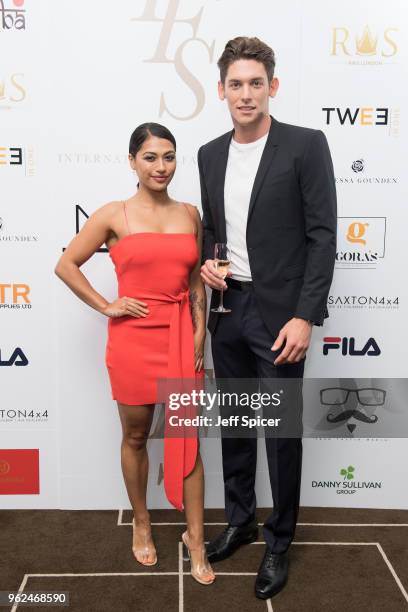 Vanessa White and Wes Myron attend the inaugural International Fashion Show at Rosewood Hotel on May 25, 2018 in London, England.