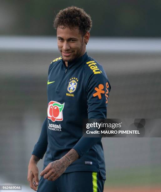 Brazil's player Neymar attends a training session of the national football team ahead of the FIFA 2018 World Cup, at Granja Comary training centre in...