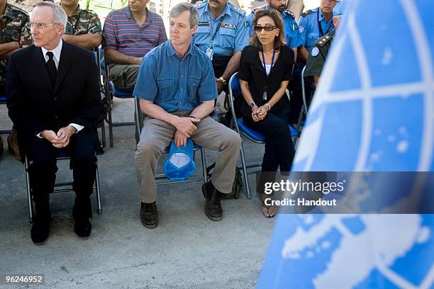 In this handout image provided by the United Nations Stabilization Mission in Haiti , acting Special Representative of the Secretary-General Edmond...