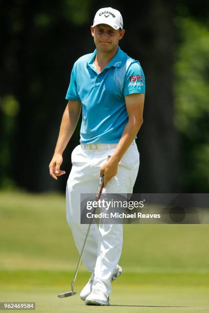 Emiliano Grillo of Argentina reacts after a putt on the 12th green during round two of the Fort Worth Invitational at Colonial Country Club on May...