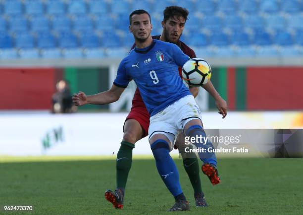 Italy and Spal forward Federico Bonazzoli with Portugal and CD Tondela defender Jorge Fernandes in action during the U21 International Friendly match...