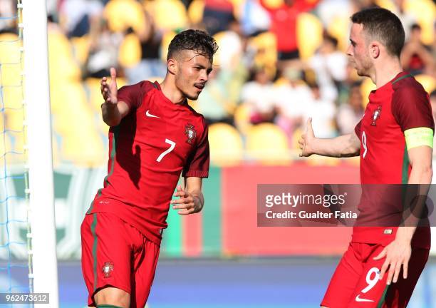 Portugal and SL Benfica forward Diogo Goncalves celebrates with teammate Portugal and Wolverhampton Wanderers forward Diogo Jota after scoring a goal...