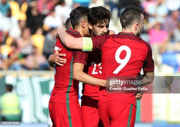 Portugal and SL Benfica forward Diogo Goncalves celebrates with teammates after scoring a goal during the U21 International Friendly match between...