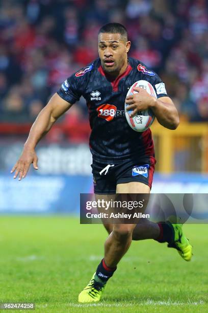 Willie Isa of Wigan Warriors runs with the ball during the Betfred Super League at KCOM Craven Park on May 25, 2018 in Hull, England.