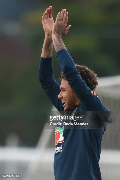 Neymar gestures during a training session of the Brazilian national football team at the squad's Granja Comary training complex on May 25, 2018 in...