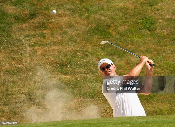 Brian DeCorso of Canada plays out of a bunker on the 18th hole during day two of the New Zealand Open at The Hills Golf Club on January 29, 2010 in...