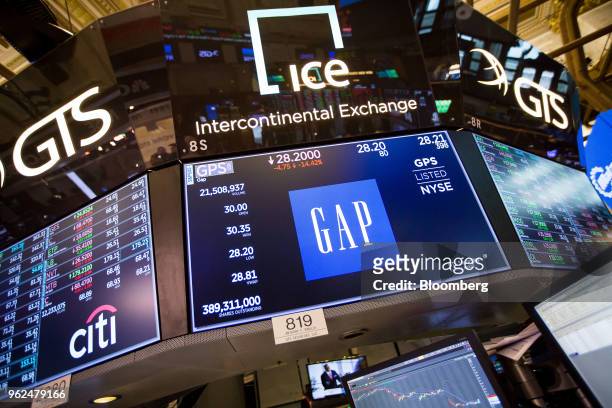Monitor displays Gap Inc. Signage on on the floor of the New York Stock Exchange in New York, U.S., on Friday, May 25, 2018. U.S. Stocks bounced...