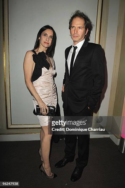 Geraldine Pailhas and Christopher Thompson attend Fashion Dinner For AIDS at Pavillon d'Armenonville on January 28, 2010 in Paris, France.