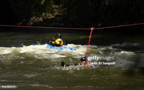 Colorado Parks and Wildlife along with members from local fire departments train with swift water rescue techniques on the Arkansas River on May 25,...