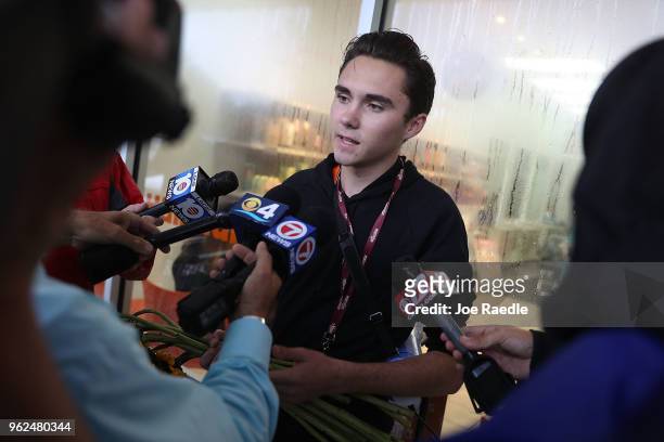 David Hogg, a survivor of the Marjory Stoneman Douglas High School mass shooting, speaks to the media before particpating in a "die'-in" protest in a...