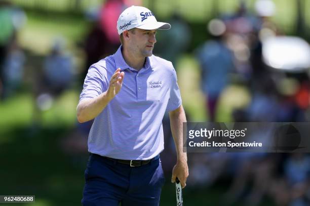 Russell Knox waves after making birdie on during the second round of the Fort Worth Invitational on May 25, 2018 at Colonial Country Club in Fort...