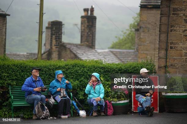 Brass band enthusiasts wait to hear bands play in the Whit Friday brass band competition, in the village of Dobcross, on May 25, 2018 in Oldham,...