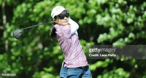 Ayako Uehara from Japan hits her tee shot on the 7th hole during round two of the LPGA Volvik Championship at Travis Pointe County Club on May 25,...