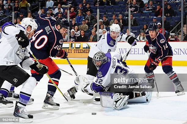Goaltender Jonathan Quick of the Los Angeles Kings stops a shot Jared Boll of the Columbus Blue Jackets during the third period on January 28, 2010...