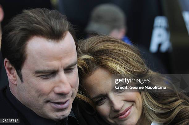 Actor John Travolta and wife actress Kelly Preston attend the "From Paris With Love" premiere at the Ziegfeld Theatre on January 28, 2010 in New York...