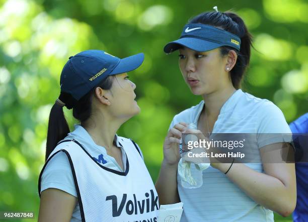 Amature player Ashley Kim from the United States talks with her caddie on the 7th hole during round two of the LPGA Volvik Championship at Travis...
