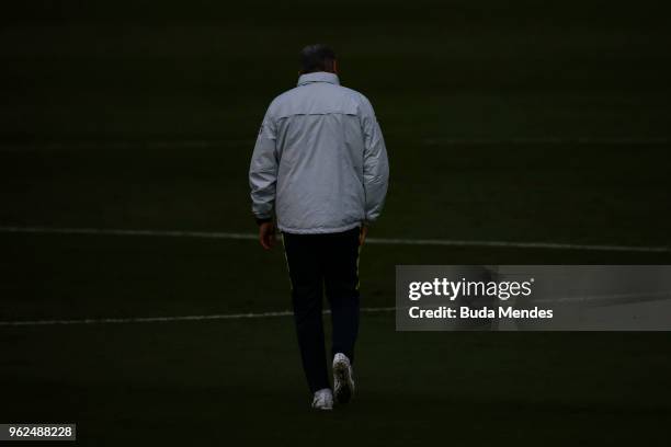 Head coach Tite walks after a training session of the Brazilian national football team at the squad's Granja Comary training complex on May 25, 2018...