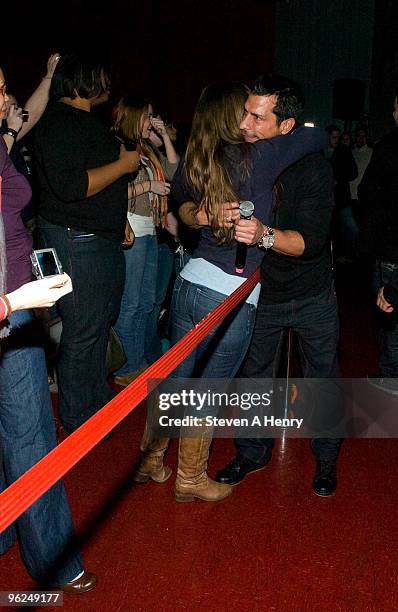 Danny Wood of the New Kids On The Block is hugged by a fan while promoting "Coming Home" at AMC Loews Raceway 10 on January 28, 2010 in Westbury, New...