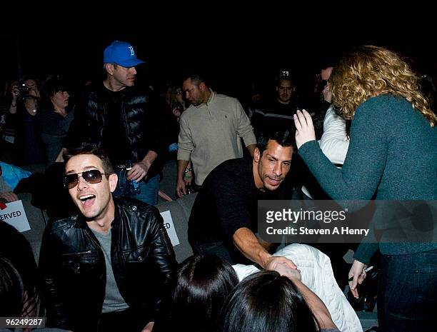 Joey McIntyre and Danny Wood of the New Kids On The Block greet fans while promoting "Coming Home" at AMC Loews Raceway 10 on January 28, 2010 in...