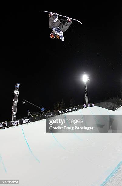 Shaun White does a backside air above the halfpipe as he went on to finish first in the Men's Snowboard Superpipe Eliminations at Winter X Games 14...