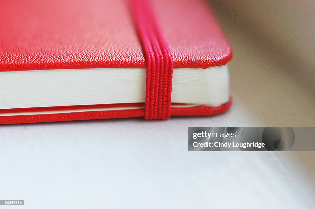 Red moleskine notebook