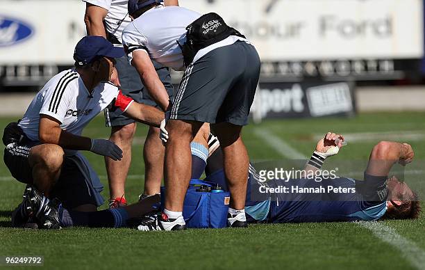 Ali Williams of the Blues lies down injured during the Super 14 trial match between the Blues and the Chiefs at North Harbour Stadium on January 29,...