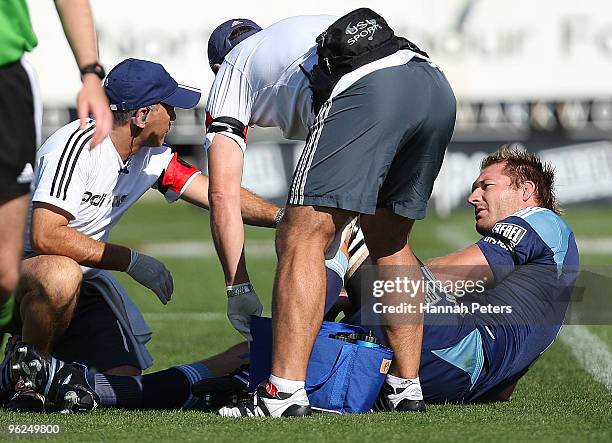 Ali Williams of the Blues lies down injured during the Super 14 trial match between the Blues and the Chiefs at North Harbour Stadium on January 29,...