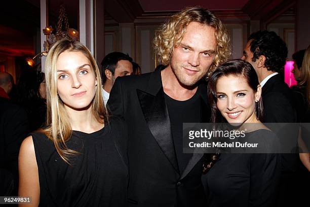 Gaia Repossi, Peter Dundas and Elsa Pataky attend the Fashion Dinner for AIDS at the Pavillon d'Armenonville on January 28, 2010 in Paris, France.