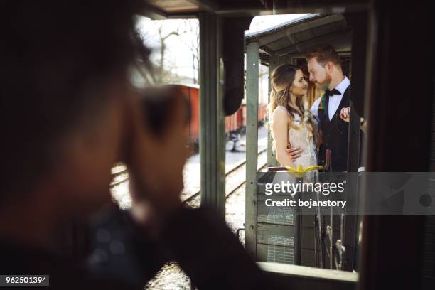 photographing wedding couple - wedding photographer stock pictures, royalty-free photos & images