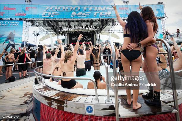 Fans watch Leaves' Eyes on the pool deck stage onboard the cruise liner 'Independence of the Seas' during the '70000 Tons of Metal' Heavy Metal...