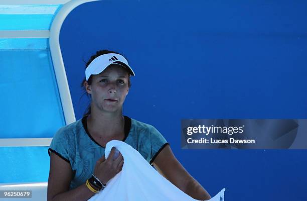 Laura Robson of Great Britain looks on between games in her semifinal juniors match against Kristyna Pliskova of the Czech Republic during day twelve...