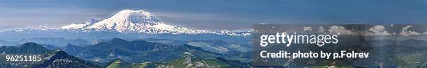 panorama of mt rainier dominating the cascades - mt rainier stock pictures, royalty-free photos & images