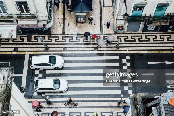 outstanding views in the rain from elevador de santa justa - elevador de santa justa stockfoto's en -beelden