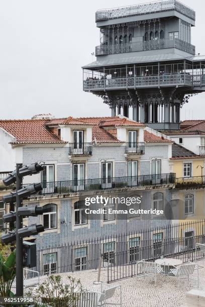 outstanding views in the rain from elevador de santa justa - elevador de santa justa stockfoto's en -beelden