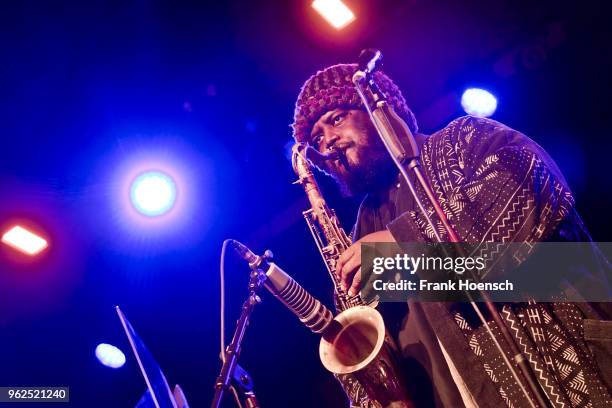 American musician Kamasi Washington performs live on stage during a concert at the Astra on May 25, 2018 in Berlin, Germany.