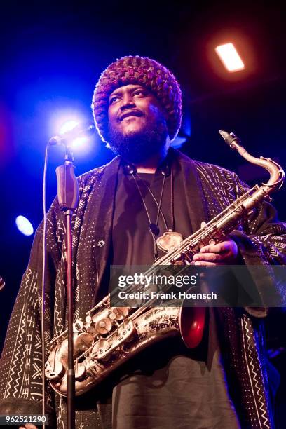 American musician Kamasi Washington performs live on stage during a concert at the Astra on May 25, 2018 in Berlin, Germany.