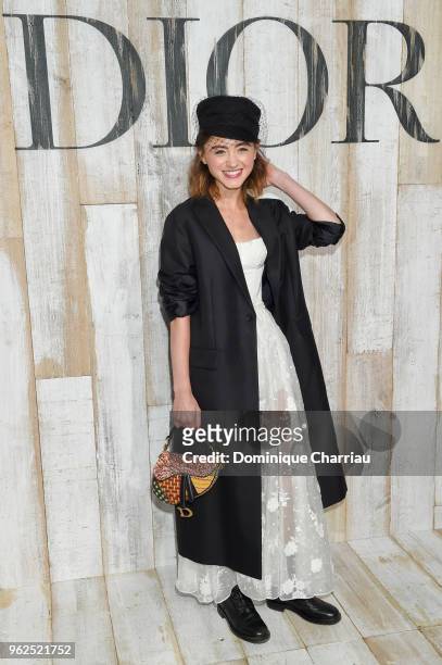 Natalia Dyer poses at a photocall during Christian Dior Couture S/S19 Cruise Collection on May 25, 2018 in Chantilly, France.