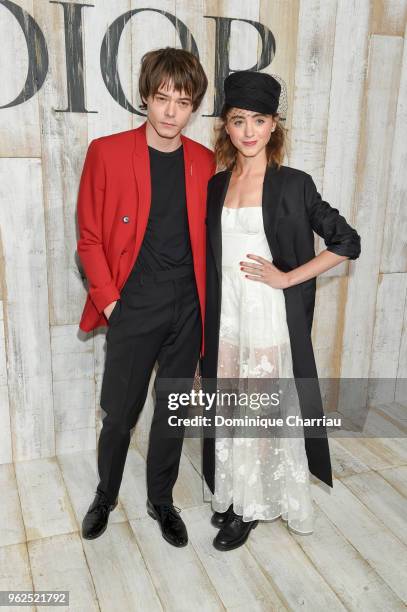 Charlie Heaton and Natalia Dyer pose at a photocall during Christian Dior Couture S/S19 Cruise Collection on May 25, 2018 in Chantilly, France.