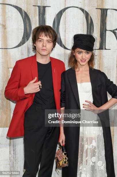 Charlie Heaton and Natalia Dyer pose at a photocall during Christian Dior Couture S/S19 Cruise Collection on May 25, 2018 in Chantilly, France.